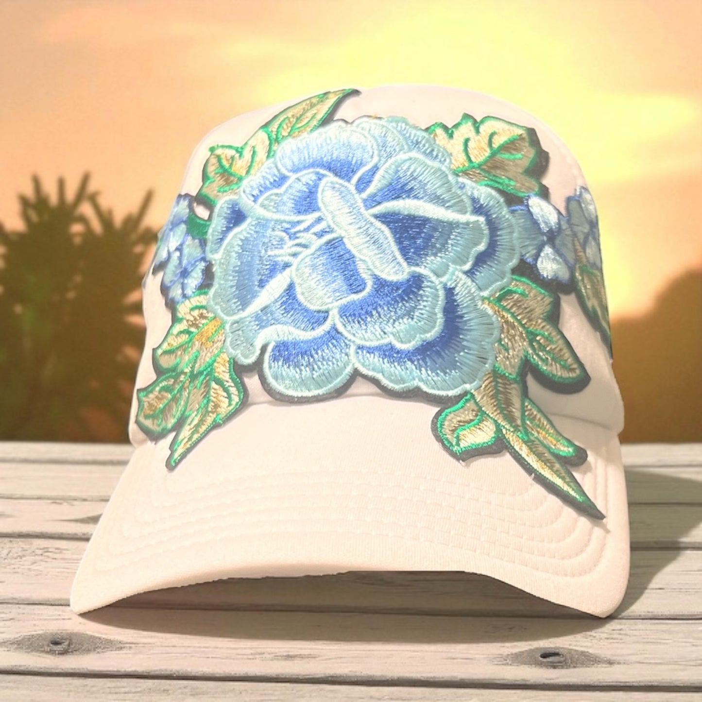All-White Trucker Hat with Baby Blue Floral Embroidery – Mesh Snapback