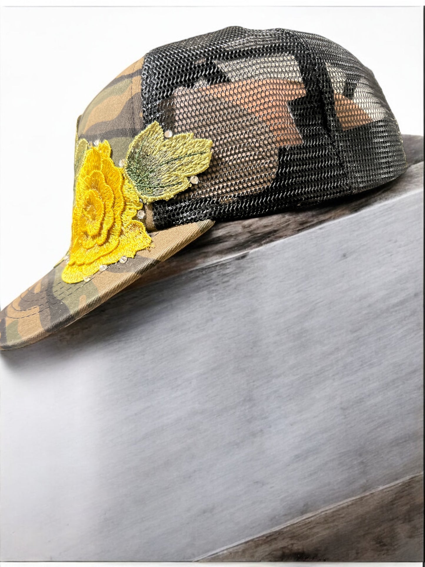 Camouflage Trucker Hat with Bold Yellow Floral Embroidery, Rhinestones, Black Mesh Snapback