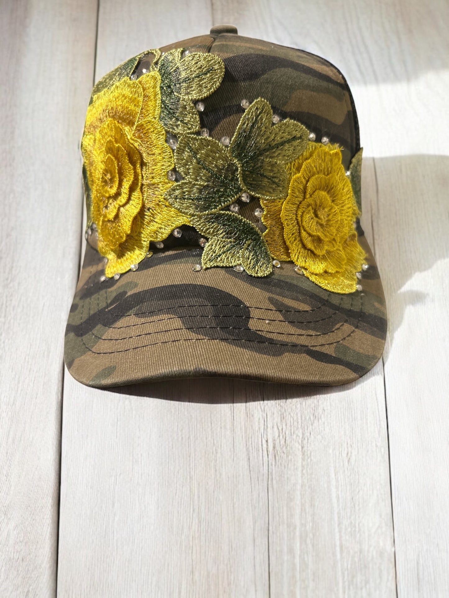 Camouflage Trucker Hat with Bold Yellow Floral Embroidery, Rhinestones, Black Mesh Snapback