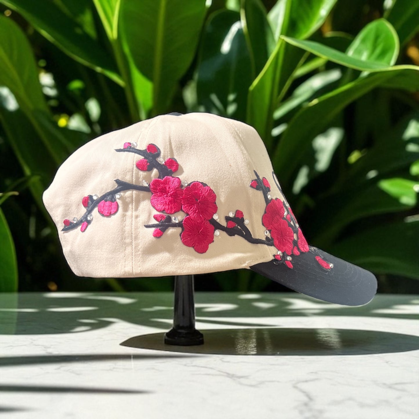 Salty Blossom Two-Tone Trucker Hat – Cream & Black Snapback with Pink Floral Embroidery & Rhinestones