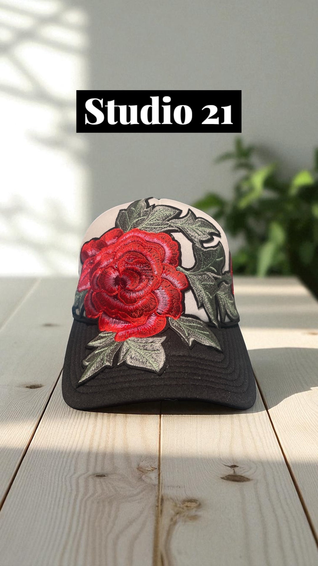 Bold Bloom Trucker Hat – Black Mesh Snapback with White Front & Red Floral Embroidery