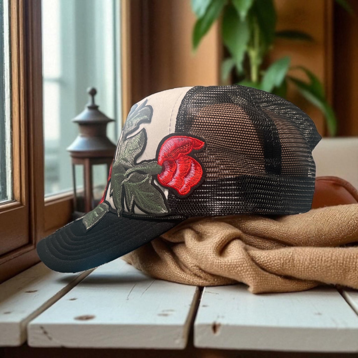 Bold Bloom Trucker Hat – Black Mesh Snapback with White Front & Red Floral Embroidery