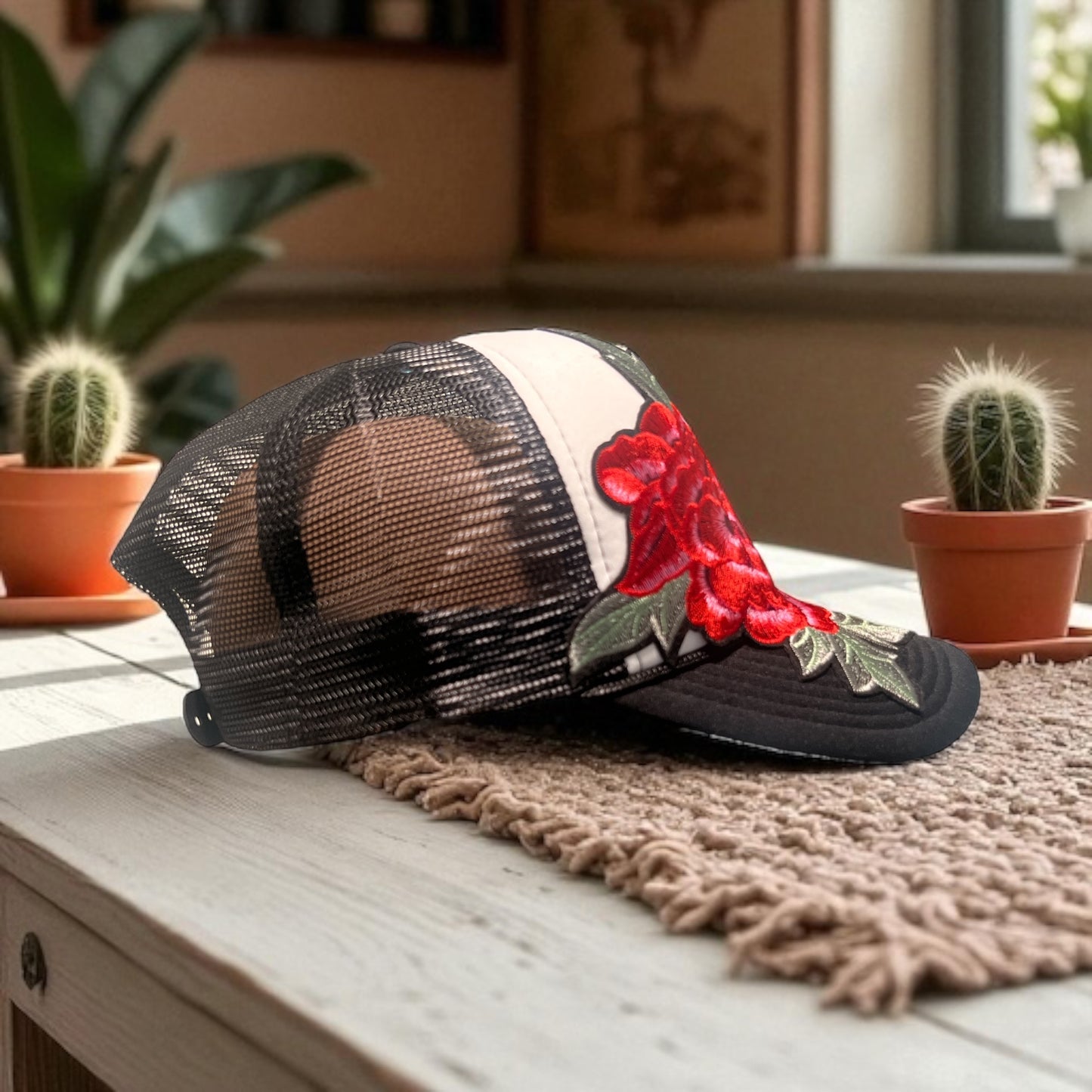 Bold Bloom Trucker Hat – Black Mesh Snapback with White Front & Red Floral Embroidery