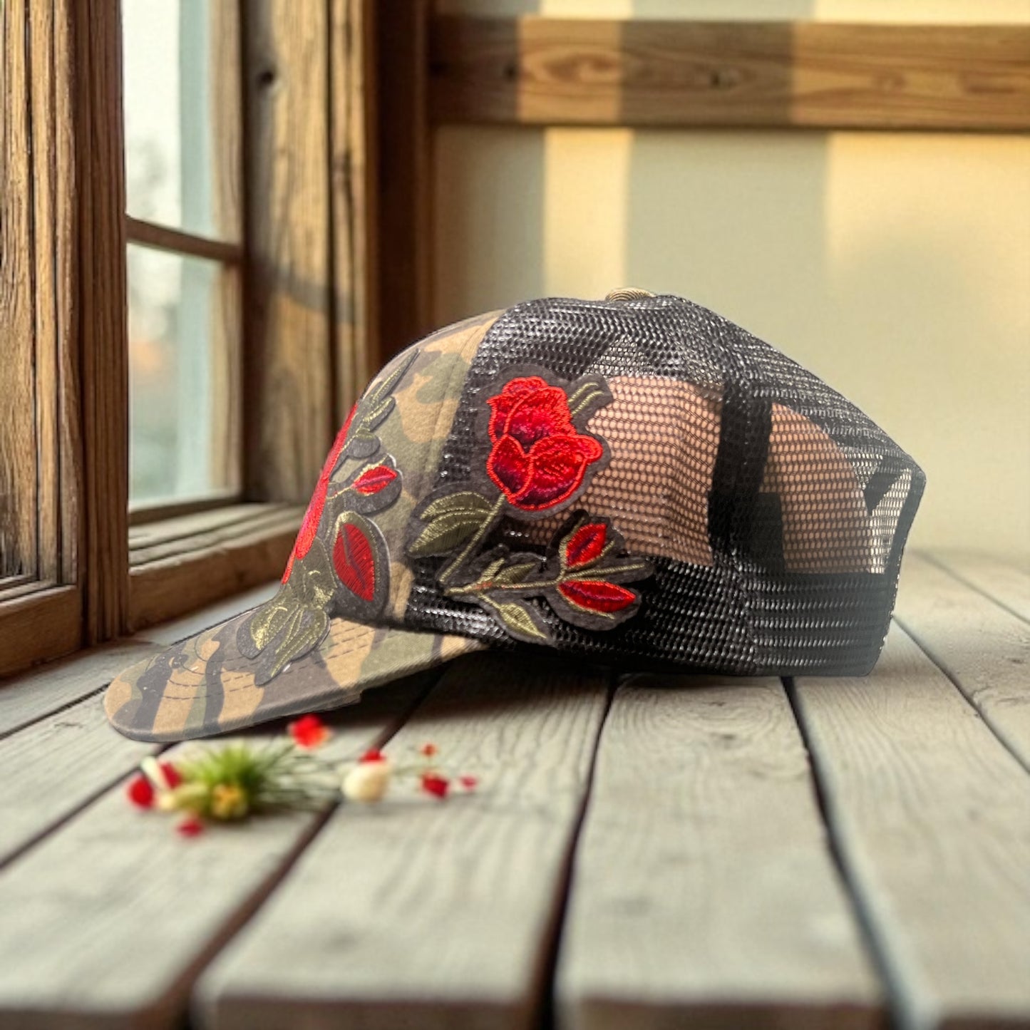 Camo Trucker Hat with Bold Red Floral Embroidery and Black Mesh Snapback
